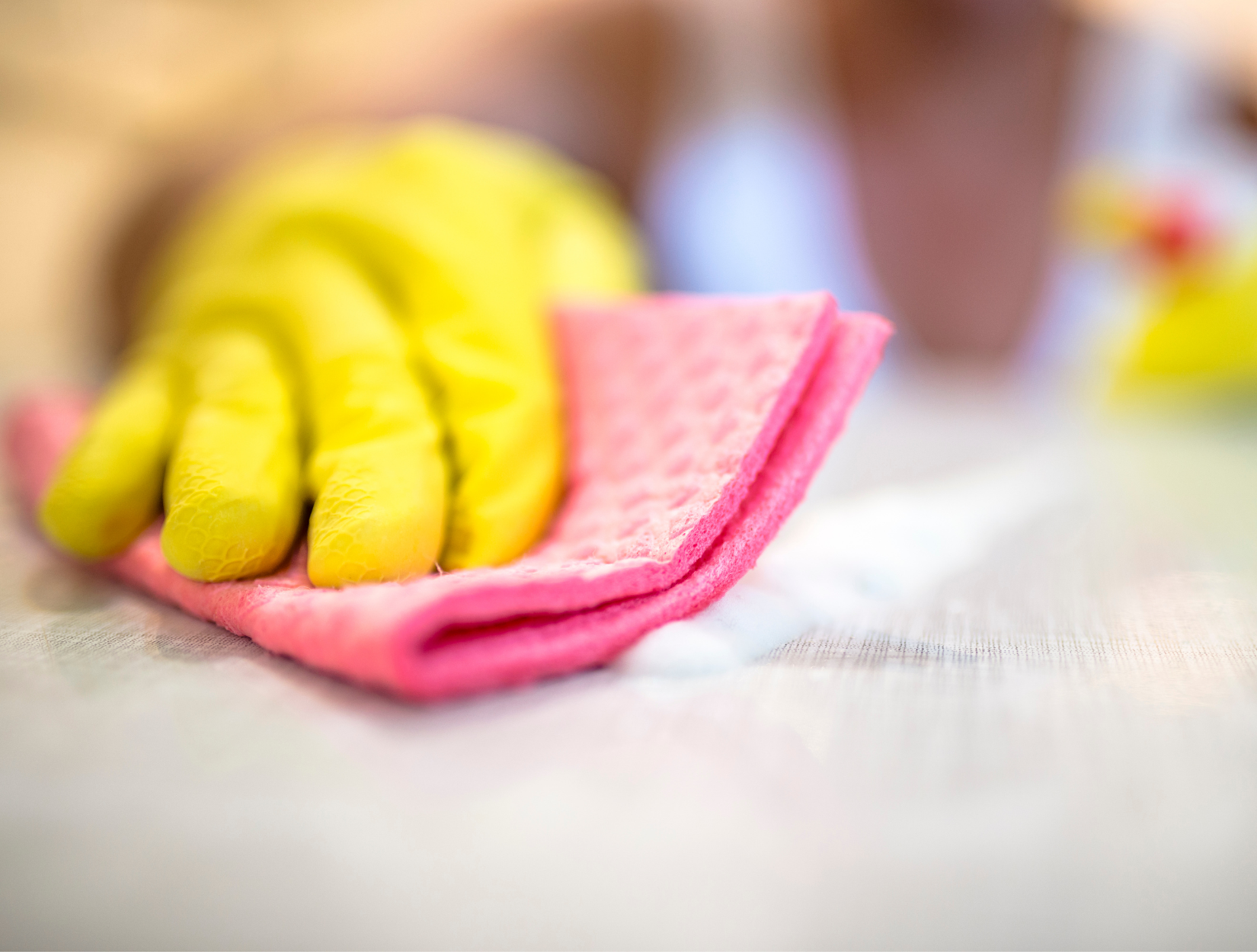 Holiday Home Cleaning Alnwick Holiday Home Cleaning Alnwick using a rubber glove and a fibre cloth